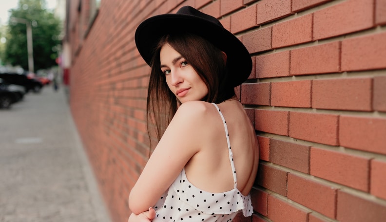 signs she wants you to notice her and get your attention